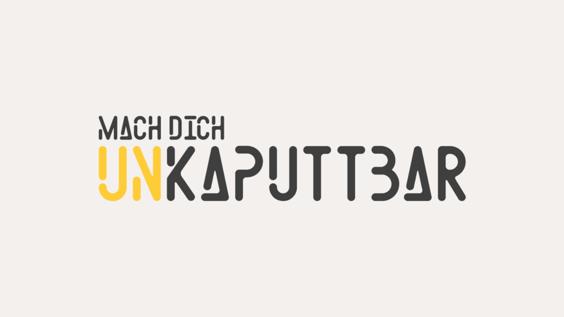 Textlogo mit dem Satz „MACH DICH UNKAPUTTBAR“ in stilisierter schwarzer und gelber Schrift auf hellem Hintergrund.